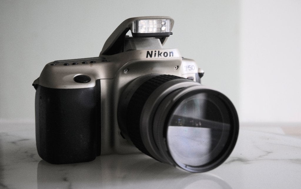 Nikon F-50 +Nikon 28-80 3.3-5.6 AF G in goede staat, Ophalen of Verzenden, Gebruikt, Spiegelreflex, Nikon