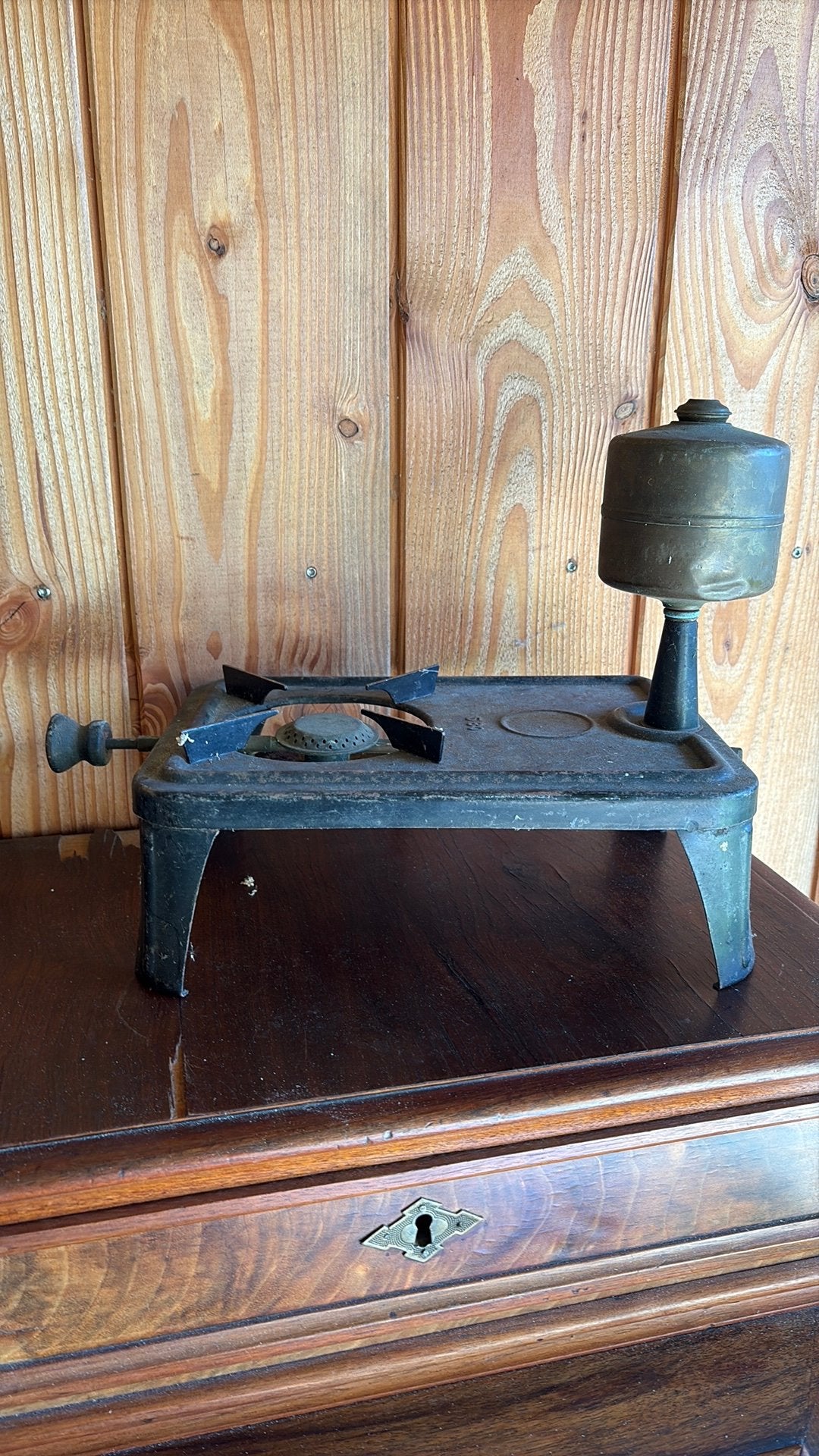 Antieke camping brander, Ophalen