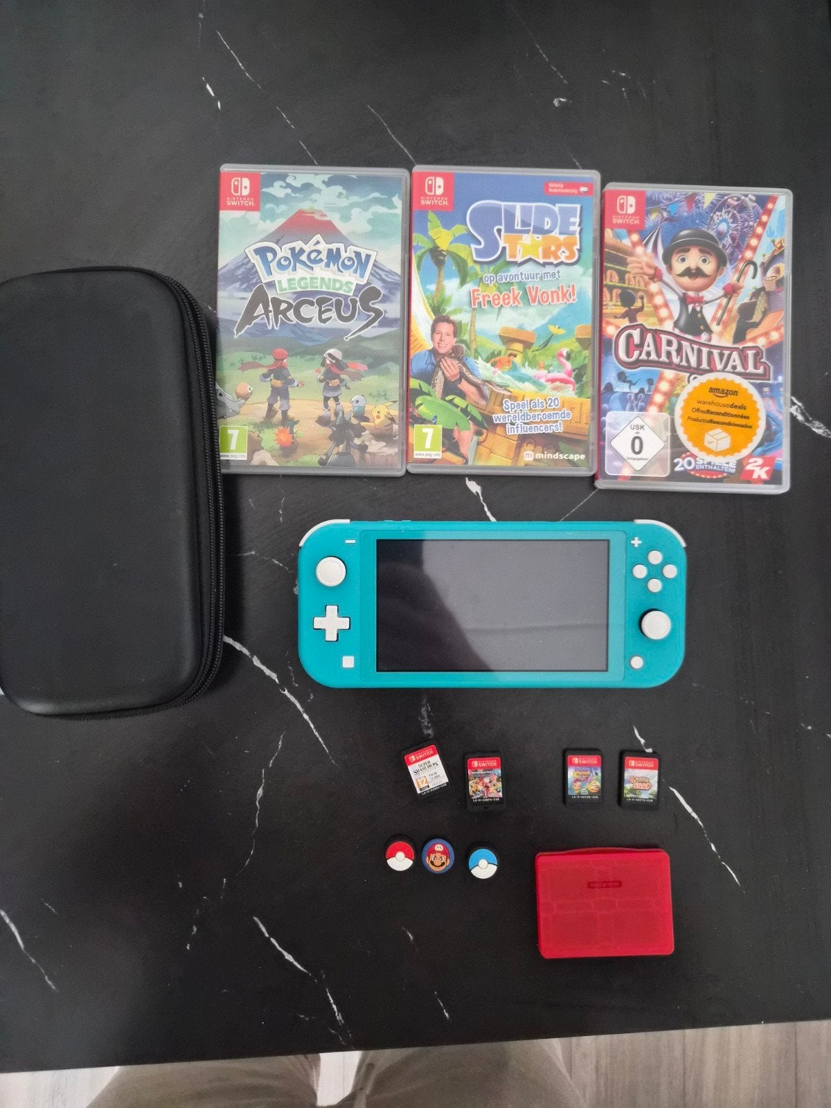 Nintendo Switch Lite Turquoise met games en hoesje, Ophalen, Turquoise, Zo goed als nieuw, Met beschermhoes of tas