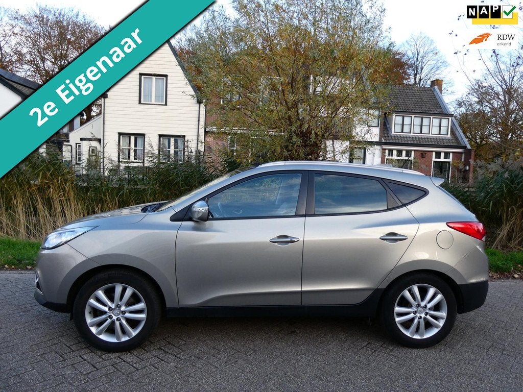 Hyundai Ix35 2.0i i-Catcher 163pk 2e eig. Clima Navi Leder T, Auto's, Hyundai, Gebruikt, Zwart, 4 cilinders, Stoelverwarming