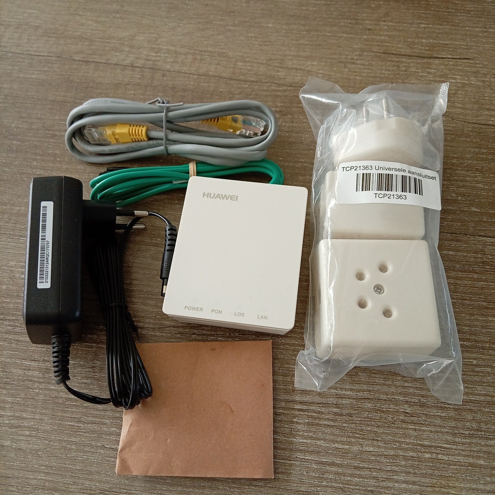 Huawei ONT Glasvezel Modem met accessoires, Ophalen of Verzenden