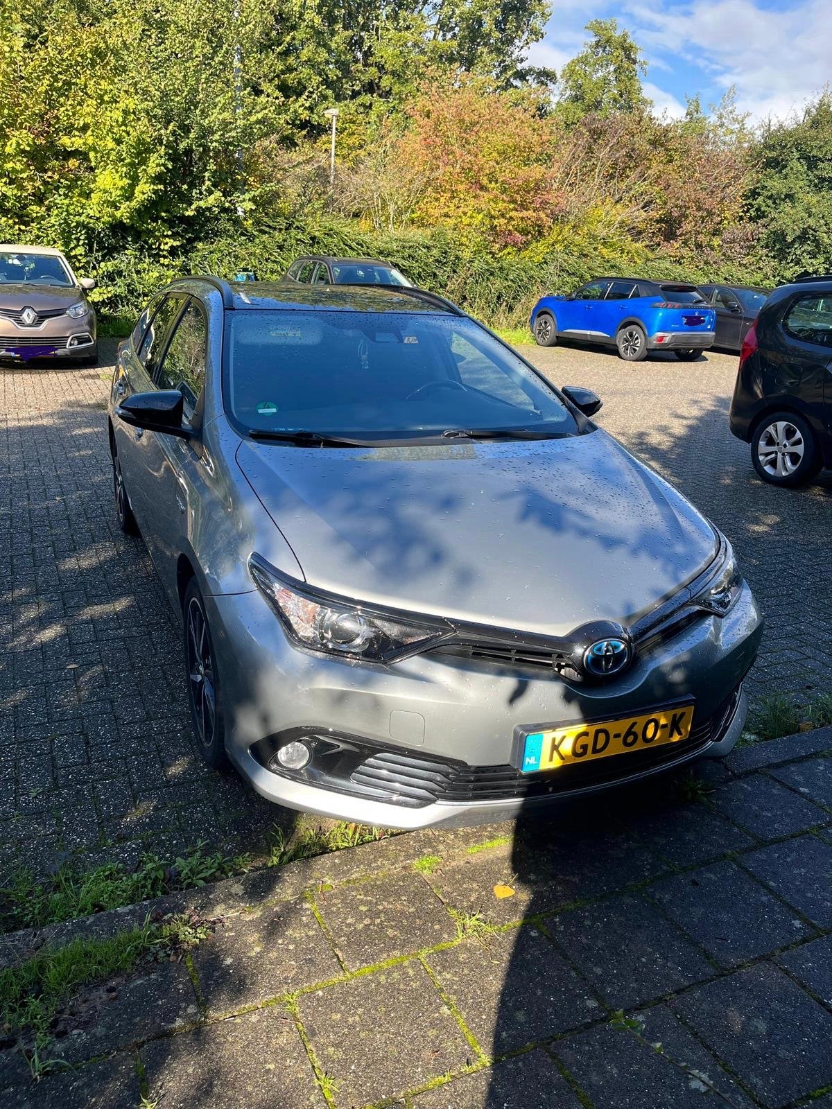 Toyota Auris 1.8 Hybrid 136pk Aut 2017 Grijs 130555km, Auto's, 25 km/l, Te koop, Volledig hybride, 5 stoelen