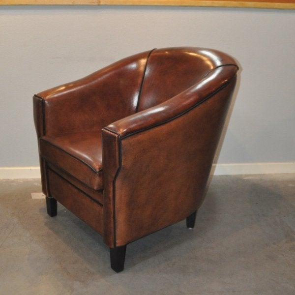 Nieuwe schapenleren fauteuil Lounge Atelier, Nieuw, Ophalen of Verzenden, 50 tot 75 cm, Leer