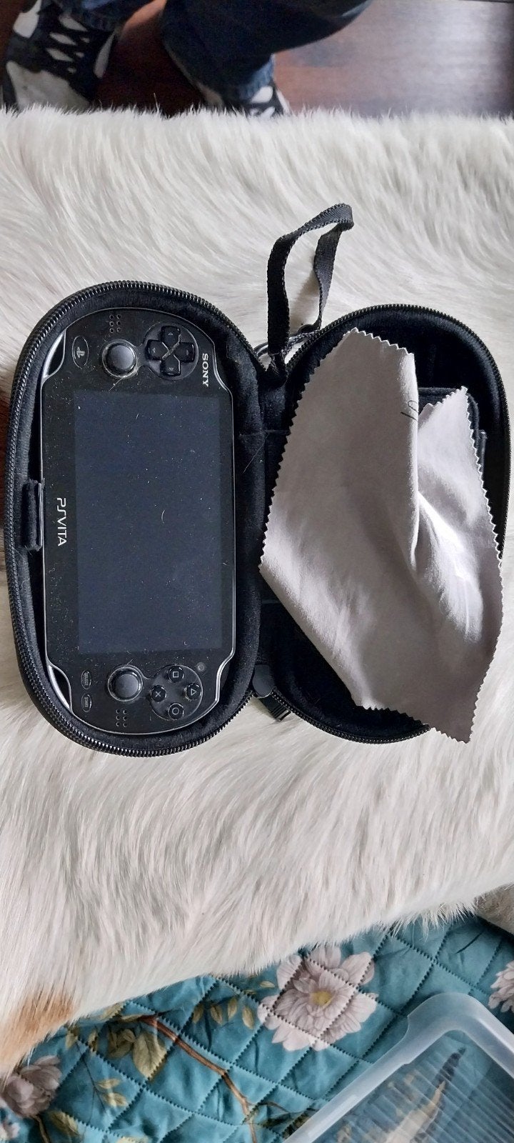PS Vita met 5 games en hoesje, Ophalen of Verzenden, Gebruikt, Zwart, Met games