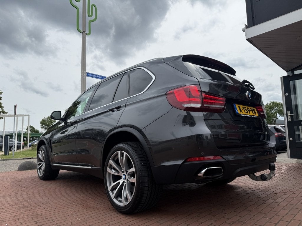 BMW X5 xDrive35i High Ex.7p leer airco navi trekhaak automaa, Auto's, BMW, 2005 kg, Gebruikt, 7 stoelen, Leder