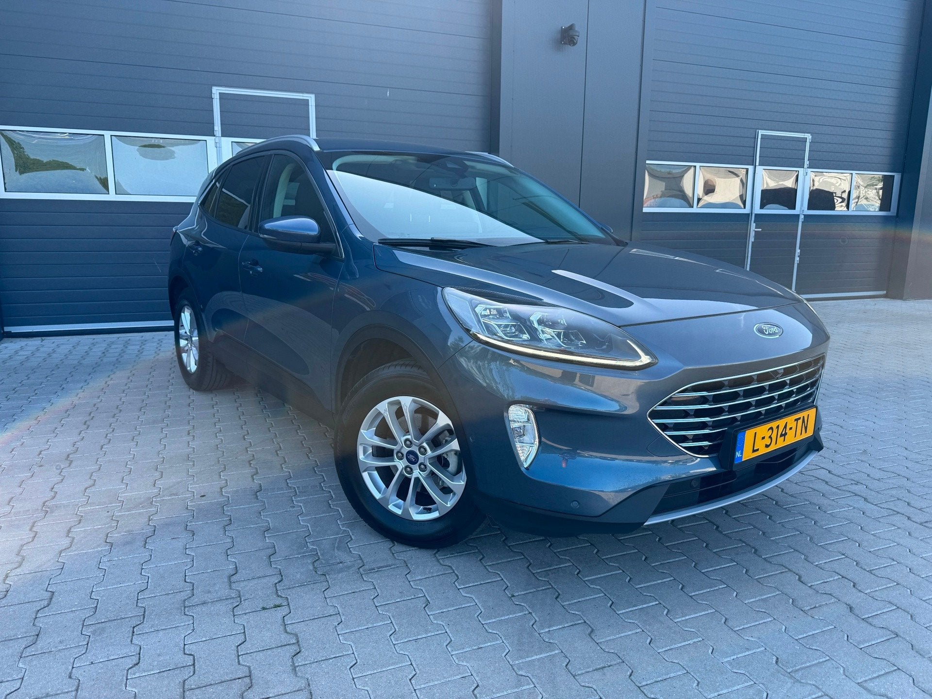 Ford Kuga 2.5 PHEV Titanium X DRIVER ASS. EN WINTER PACK, Dealer onderhouden, Gebruikt, Euro 6, 4 cilinders