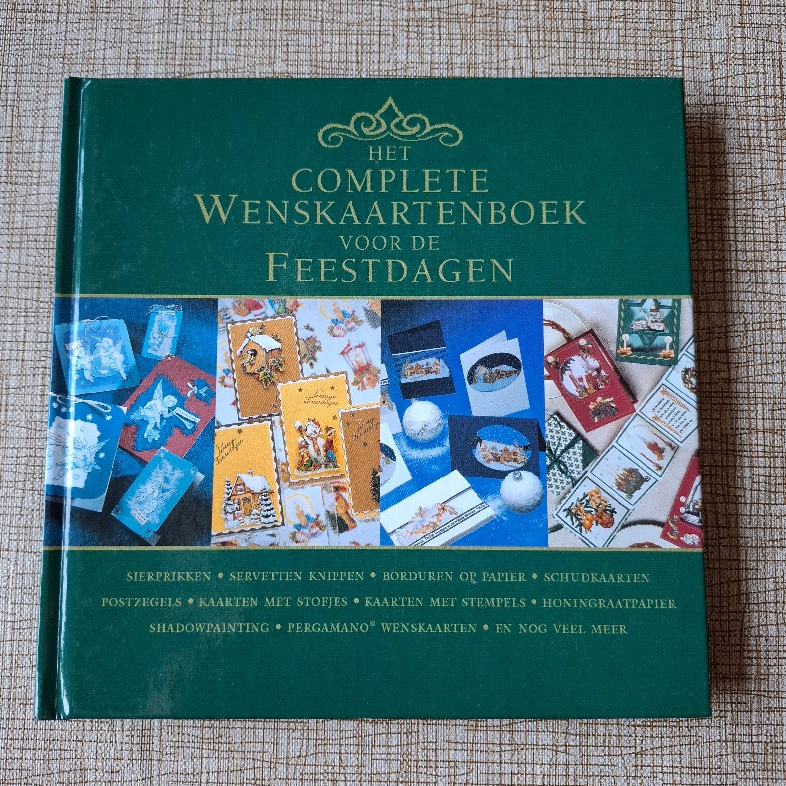 Het complete wenskaartenboek voor de feestdagen., Hobby en Vrije tijd, Ophalen of Verzenden, Zo goed als nieuw, Overige thema's