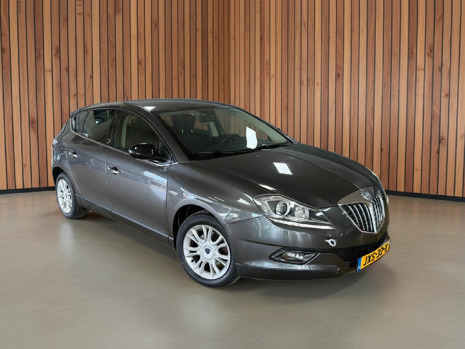 Lancia Delta 1.4-16V Argento | Airco | Multimedia | Camera, Auto's, Voorwielaandrijving, Gebruikt, 1295 kg, 4 cilinders