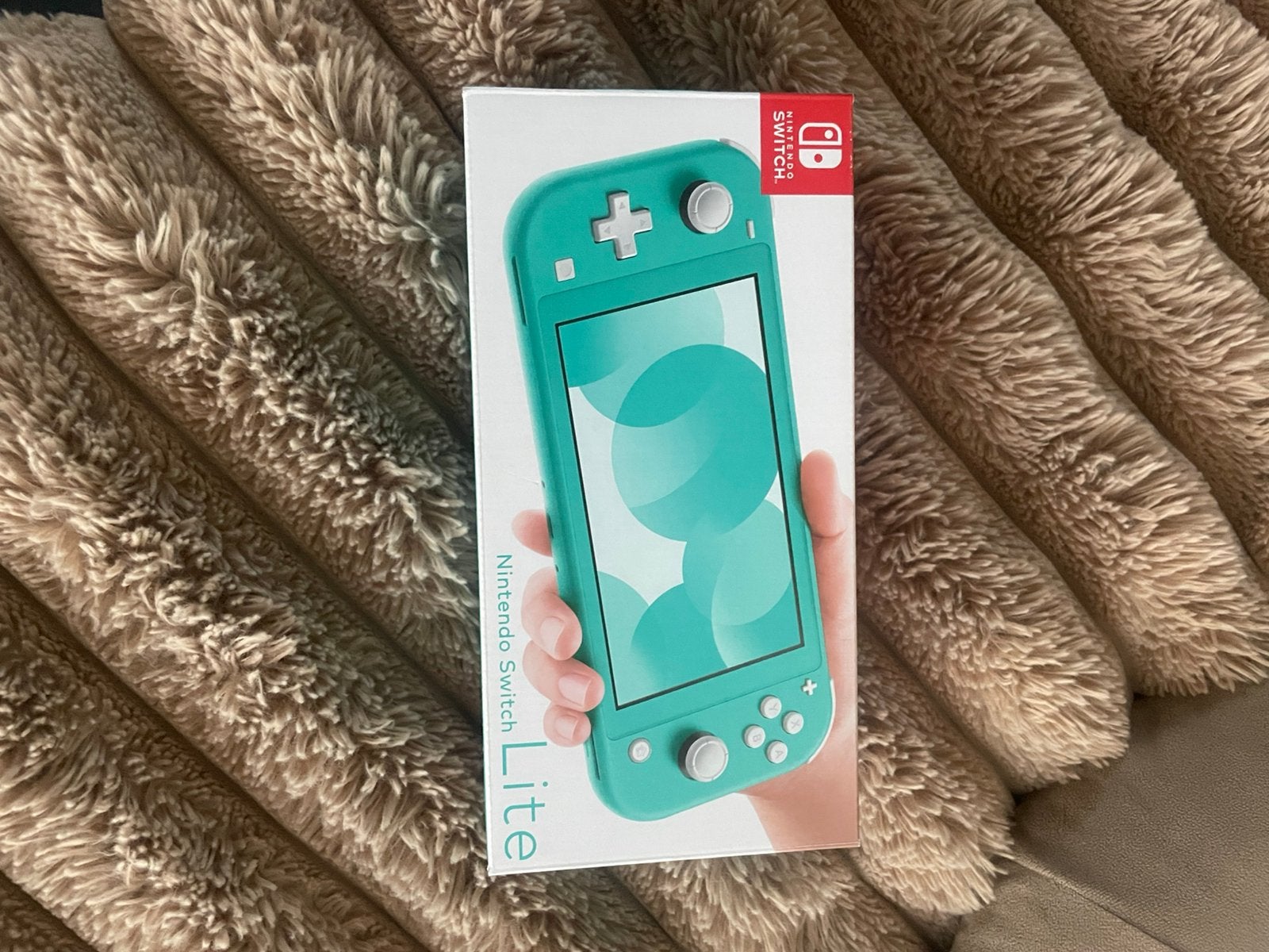 Nitendo switch lite turquoise, Spelcomputers en Games, Ophalen, Turquoise, Zo goed als nieuw, Met beschermhoes of tas