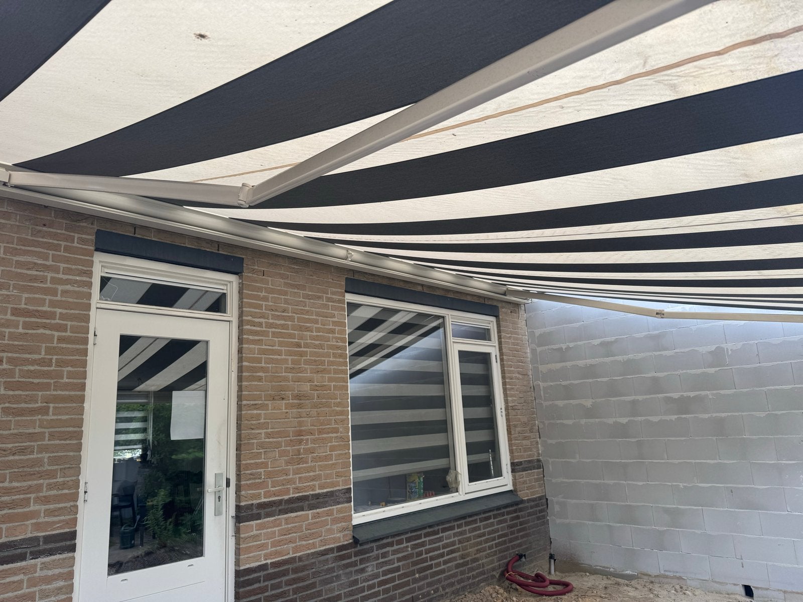 Elektrisch zonneluifel 5,5 m breed, 3,5 m uitval, Ophalen, Gebruikt, 450 cm of meer, Elektrisch