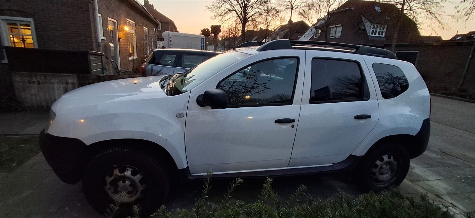 Dacia Duster 1.6 16V 74KW 2011 Wit, Auto's, Dacia, Particulier, Duster, Benzine, C, SUV of Terreinwagen, Handgeschakeld, Origineel Nederlands