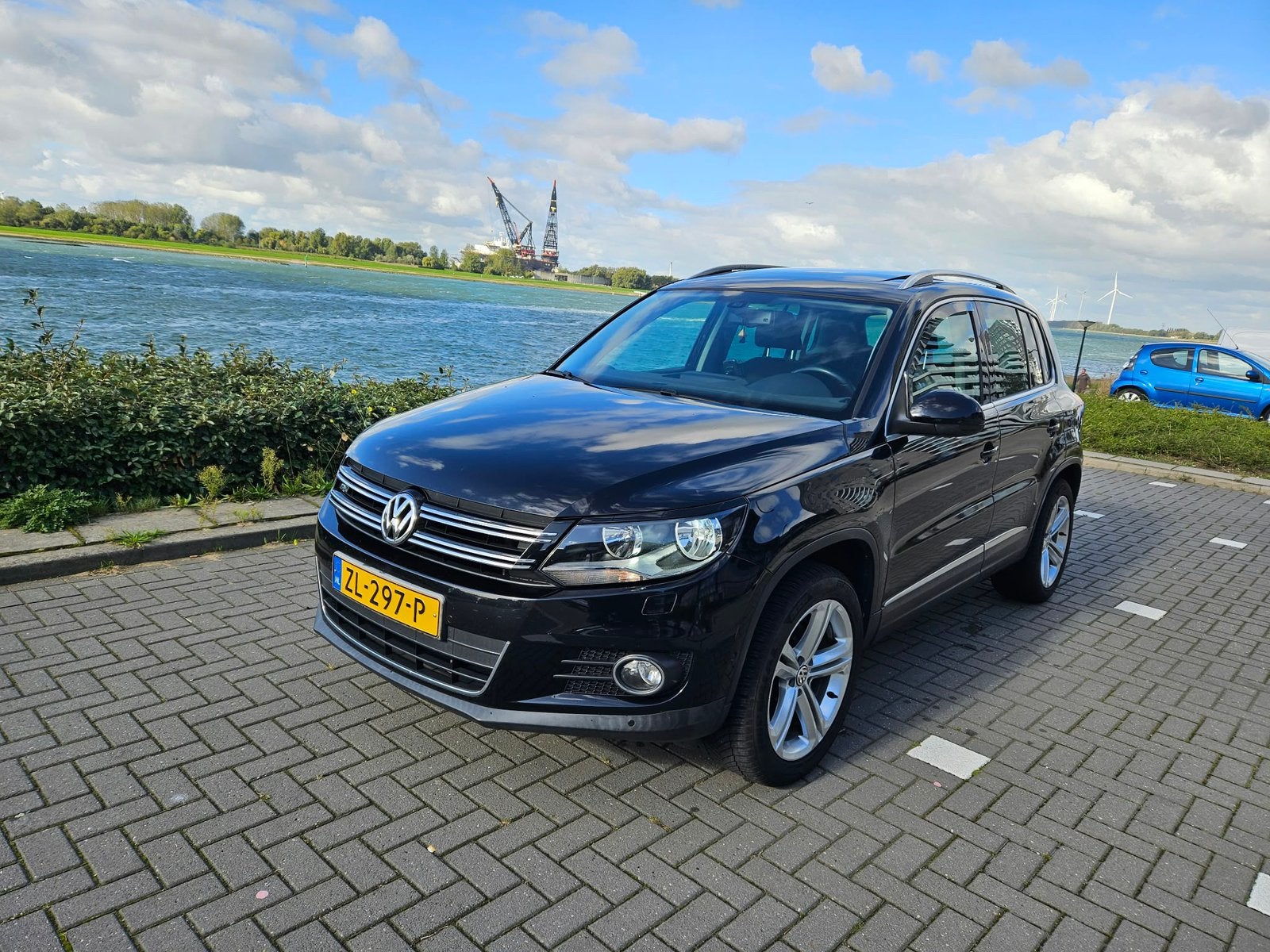Volkswagen Tiguan 1.4 TSI 118KW BMT 2012 Zwart, Auto's, Voorwielaandrijving, 1800 kg, Zwart, 4 cilinders