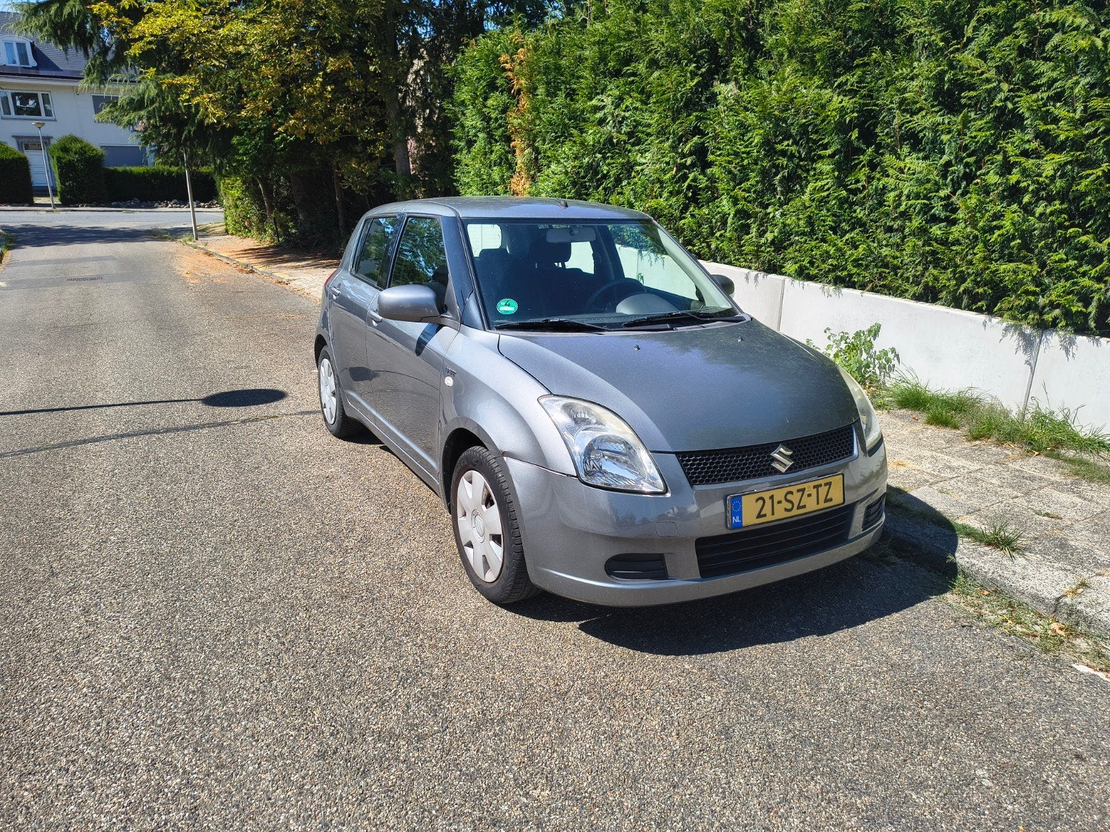 Suzuki Swift 1.5 5D 2006 Grijs NAP 2e eigenaar, Voorwielaandrijving, 40 €/maand, Zwart, 4 cilinders