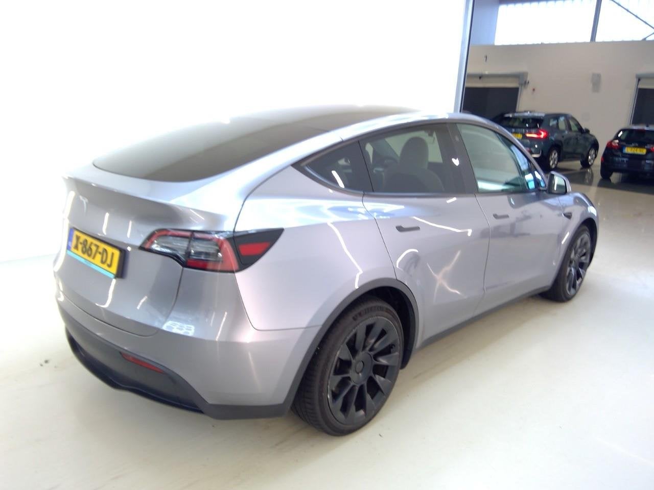 Foto 3 van Tesla Model Y Long Range AWD 351pk 92,9% SoH [ WIT LEDER+QUI