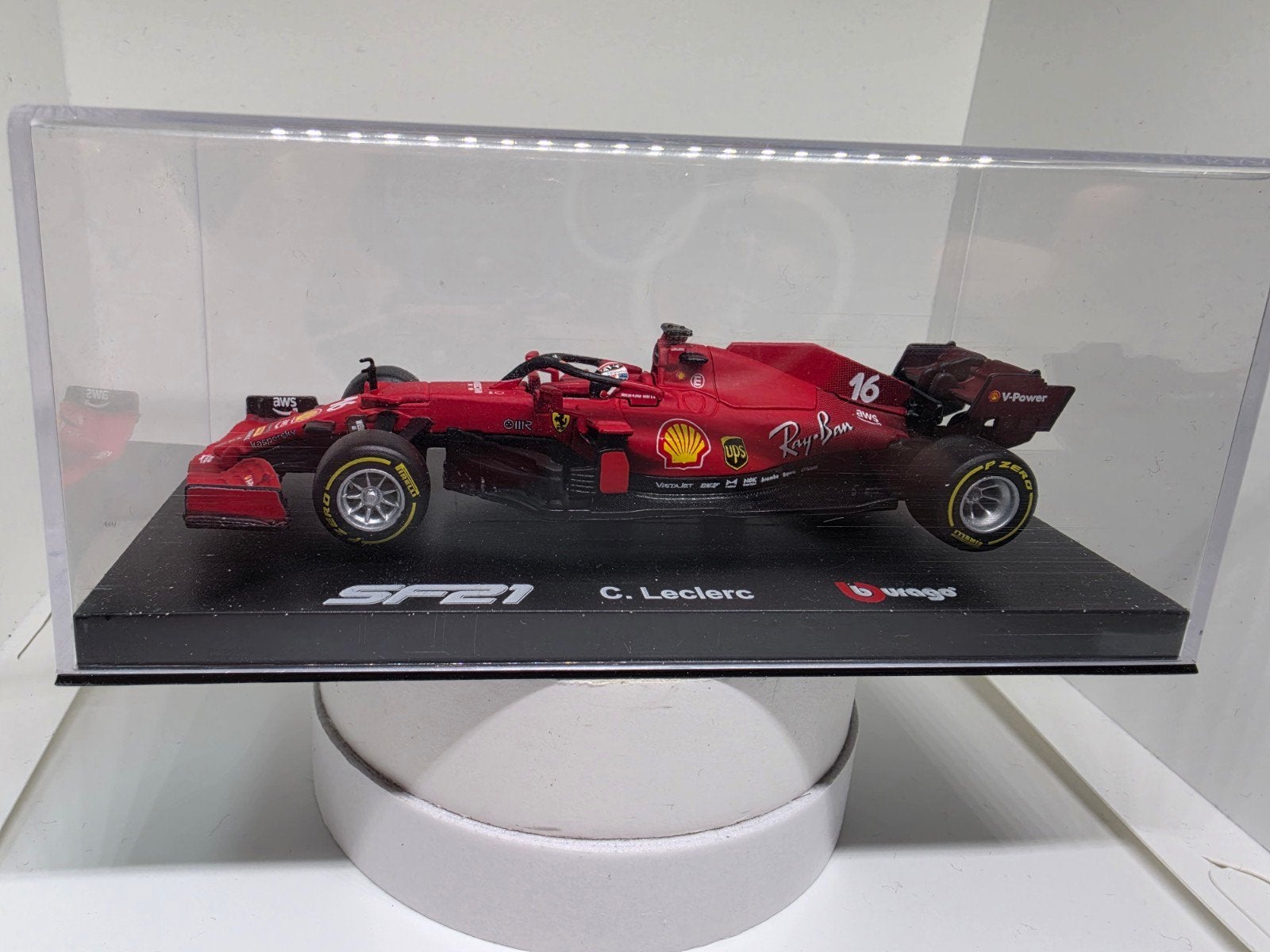 Burago Ferrari SF21 C. Leclerc 1:43 luxe editon, Hobby en Vrije tijd, Ophalen of Verzenden, Zo goed als nieuw, Auto