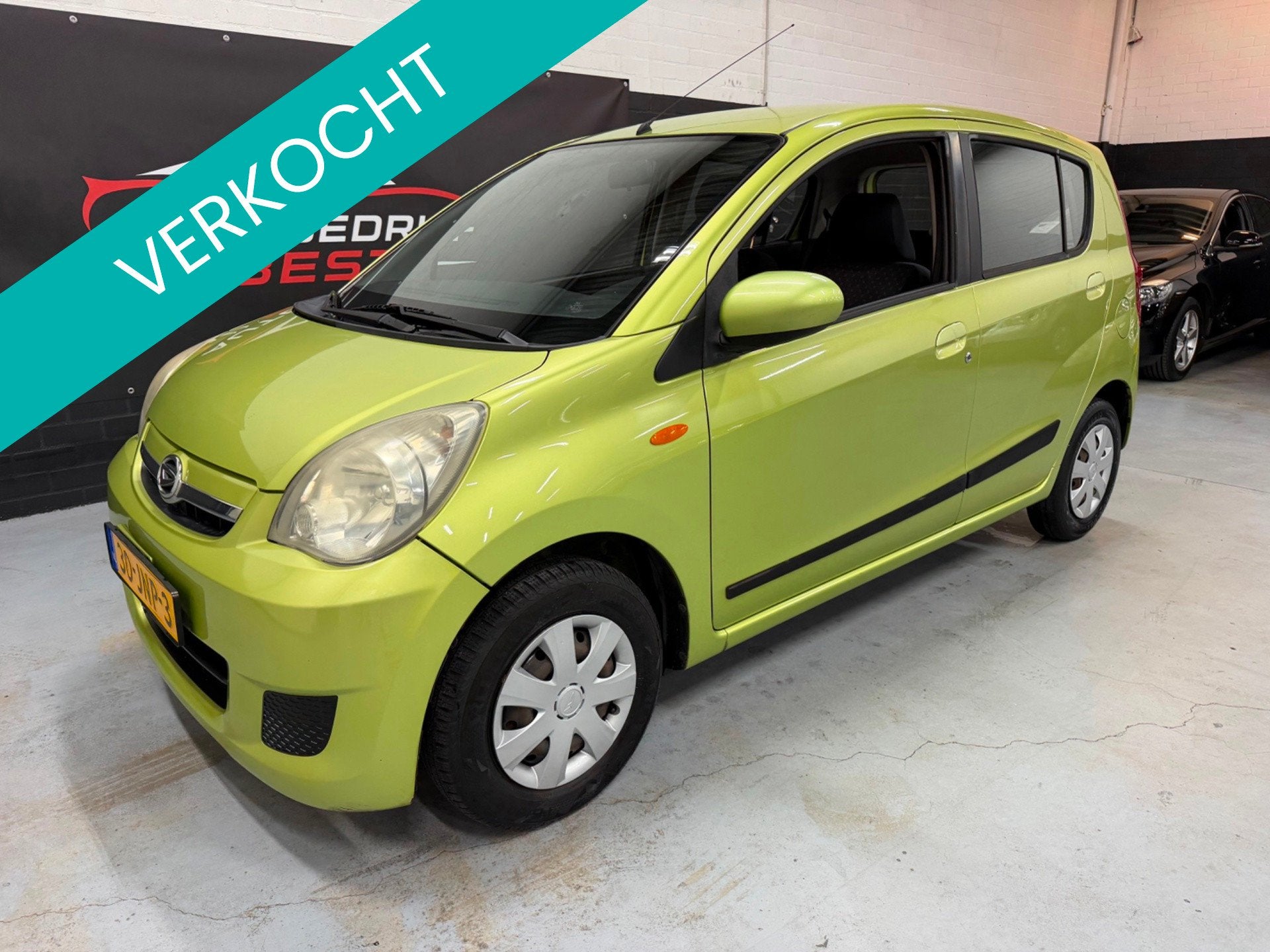 Daihatsu Cuore 1.0 Class Nap/Airco/APK 14-07-2027!, Voorwielaandrijving, Dealer onderhouden, Stof, Zwart