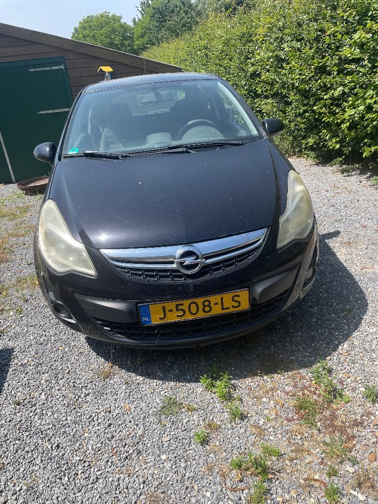 Opel Corsa 1.4 16V 3D 2011 Zwart, Auto's, Voorwielaandrijving, 40 €/maand, 1398 cc, 4 cilinders
