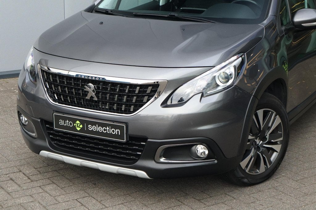 Peugeot 2008 1.2 PureTech Allure / Climate / PDC / Cruise, Stof, 1199 cc, Bedrijf, 630 kg