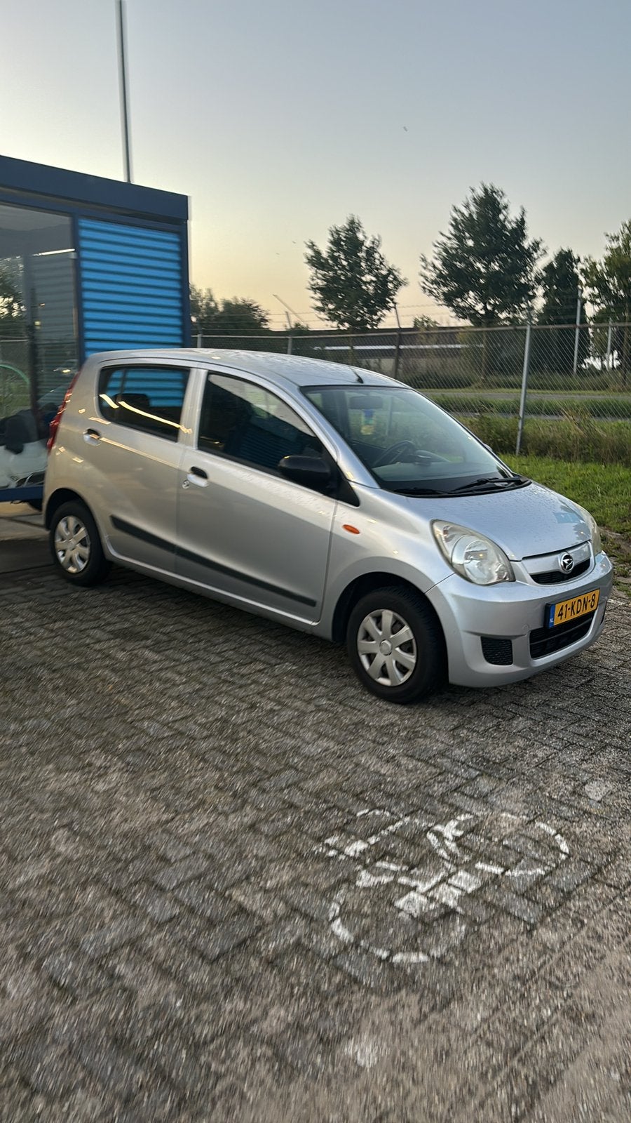 Daihatsu Cuore 1.0 5D 2009 Grijs NAP APK, Auto's, Voorwielaandrijving, Stof, 600 kg, Zwart