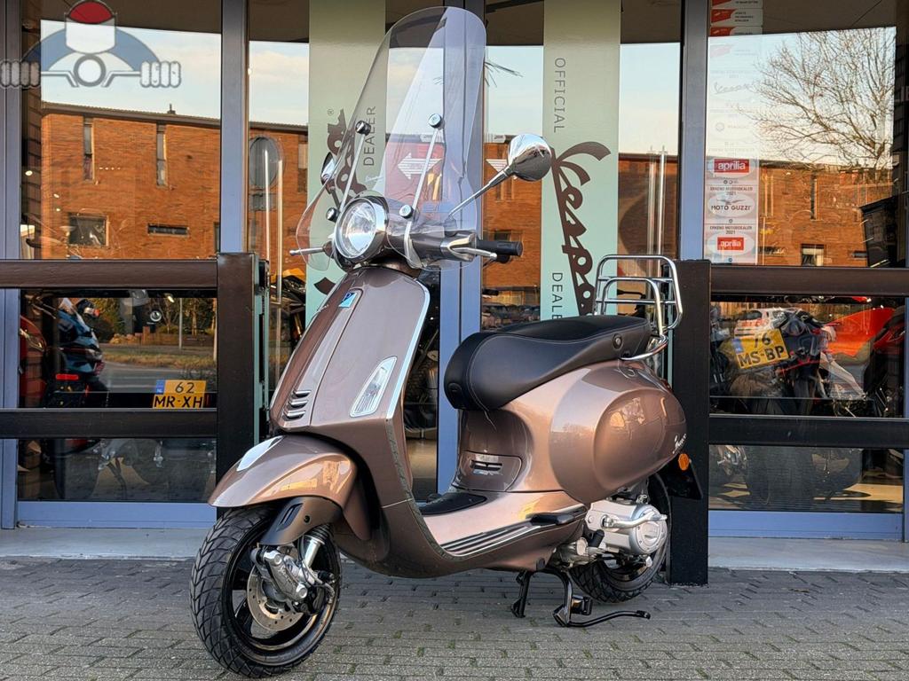 Vespa Primavera Marone bruin 1946 km 09-2014 1e eig. 25km, Fietsen en Brommers, Scooters | Vespa, Ophalen, Overige modellen, Onbekend