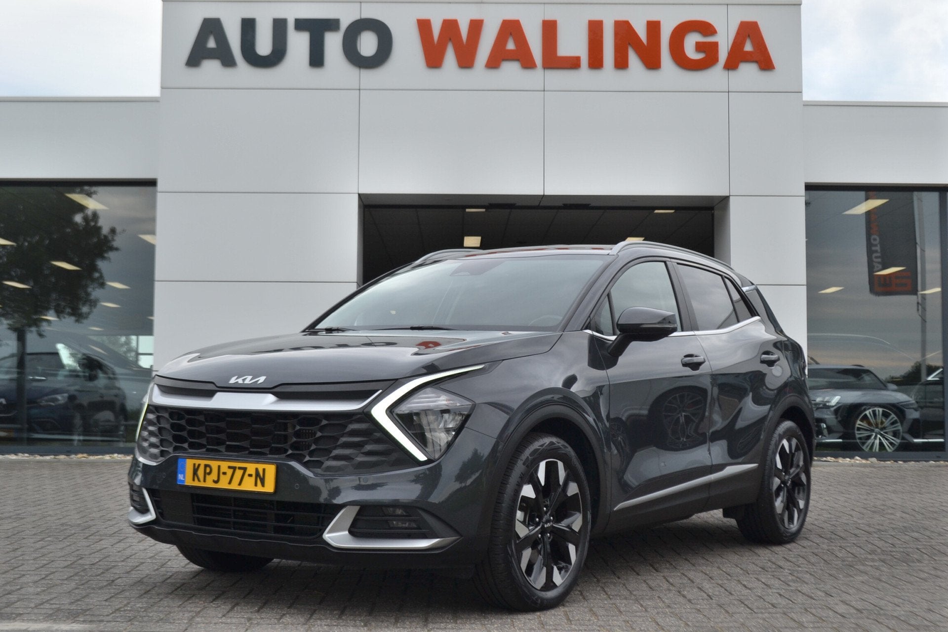 Kia Sportage 1.6 T-GDi Plug-in Hybrid AWD DynamicLine Achter, Auto's, Automaat, Stof, Gebruikt, Plug-in hybride