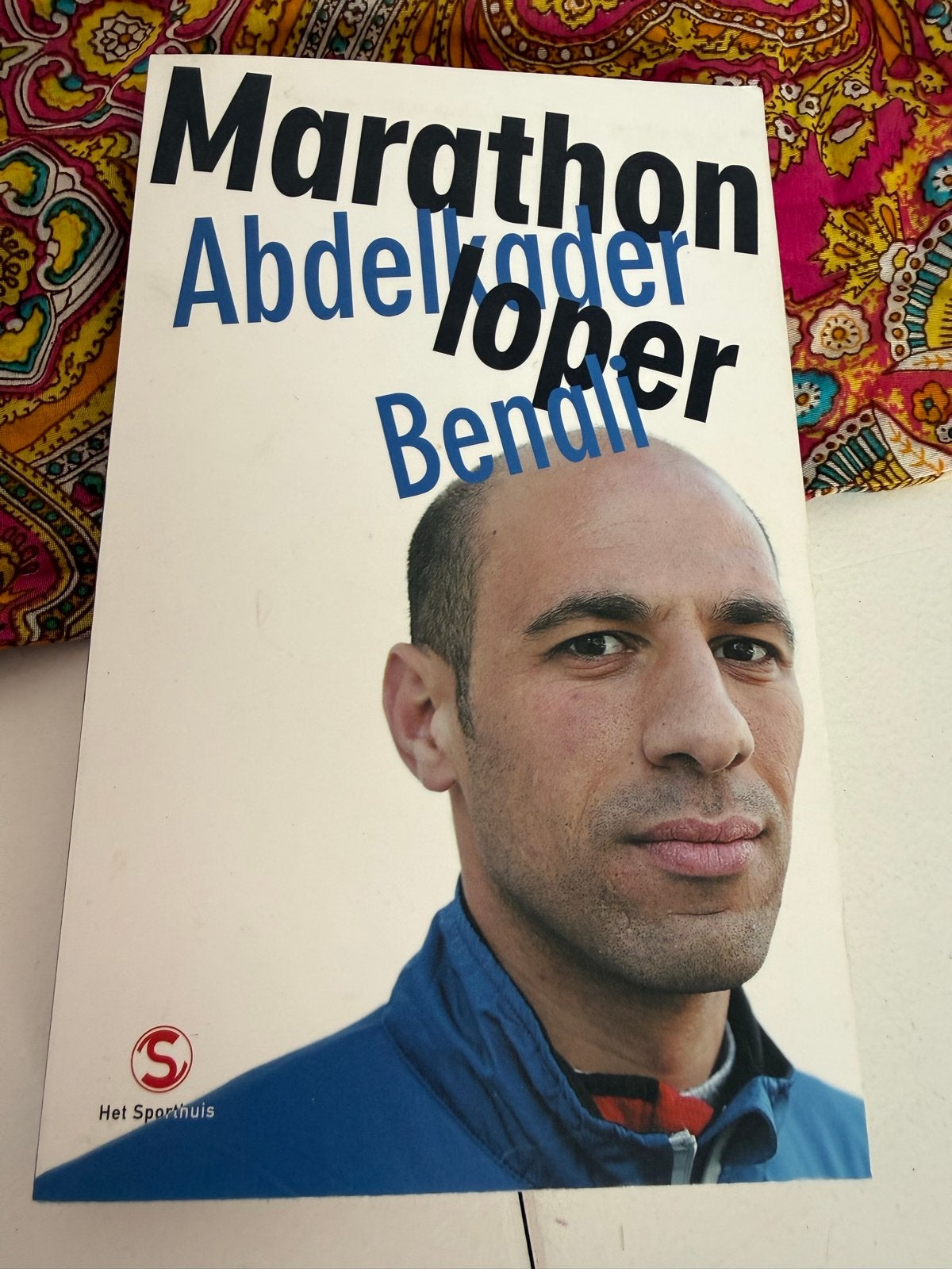 Marathonloper Abdelkader Benali - Het sporthuis, Ophalen of Verzenden, Zo goed als nieuw, Lopen en Fietsen