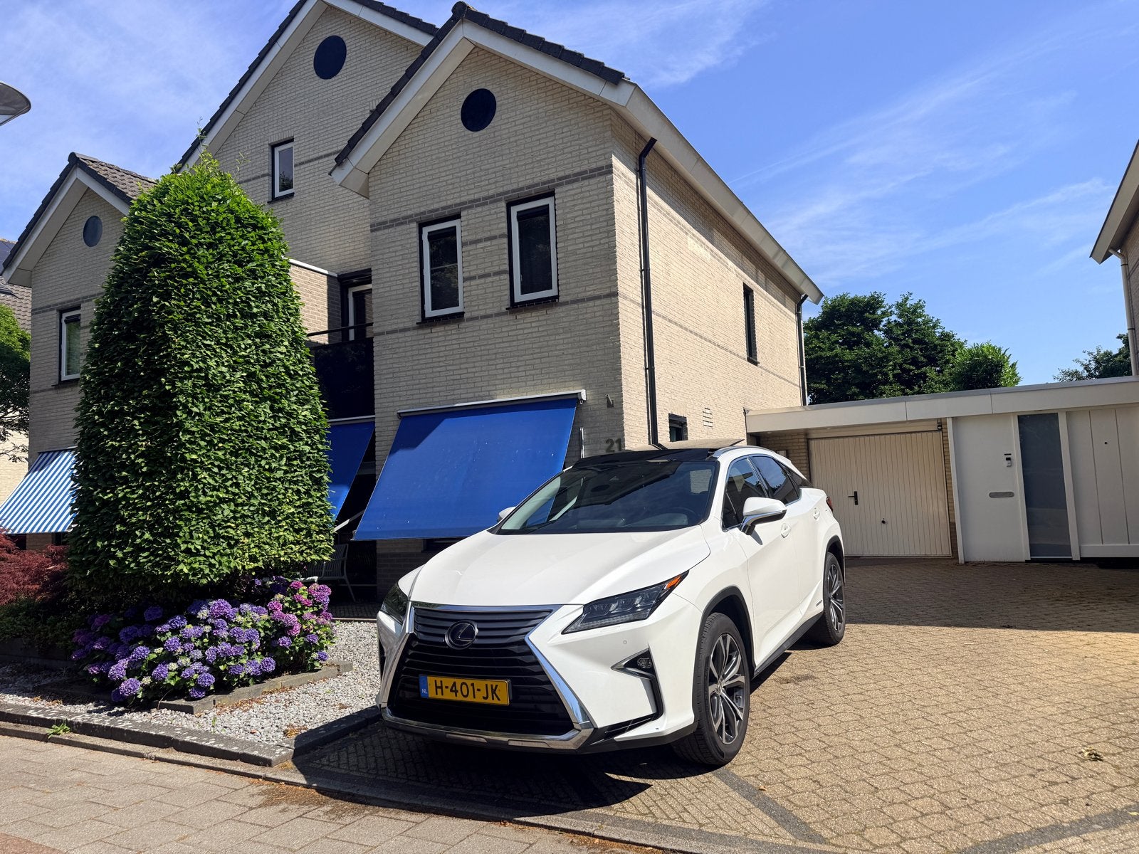 Lexus RX 450H executive met trekhaak, pano,  20”, dealer OH, Auto's, Lexus, Automaat, 2000 kg, 138 €/maand, Wit