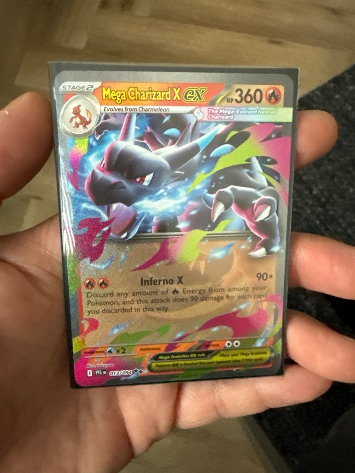 Mega Charizard X EX Pokémon kaart - Zeldzaam en krachtig, Ophalen of Verzenden, Zo goed als nieuw, Losse kaart