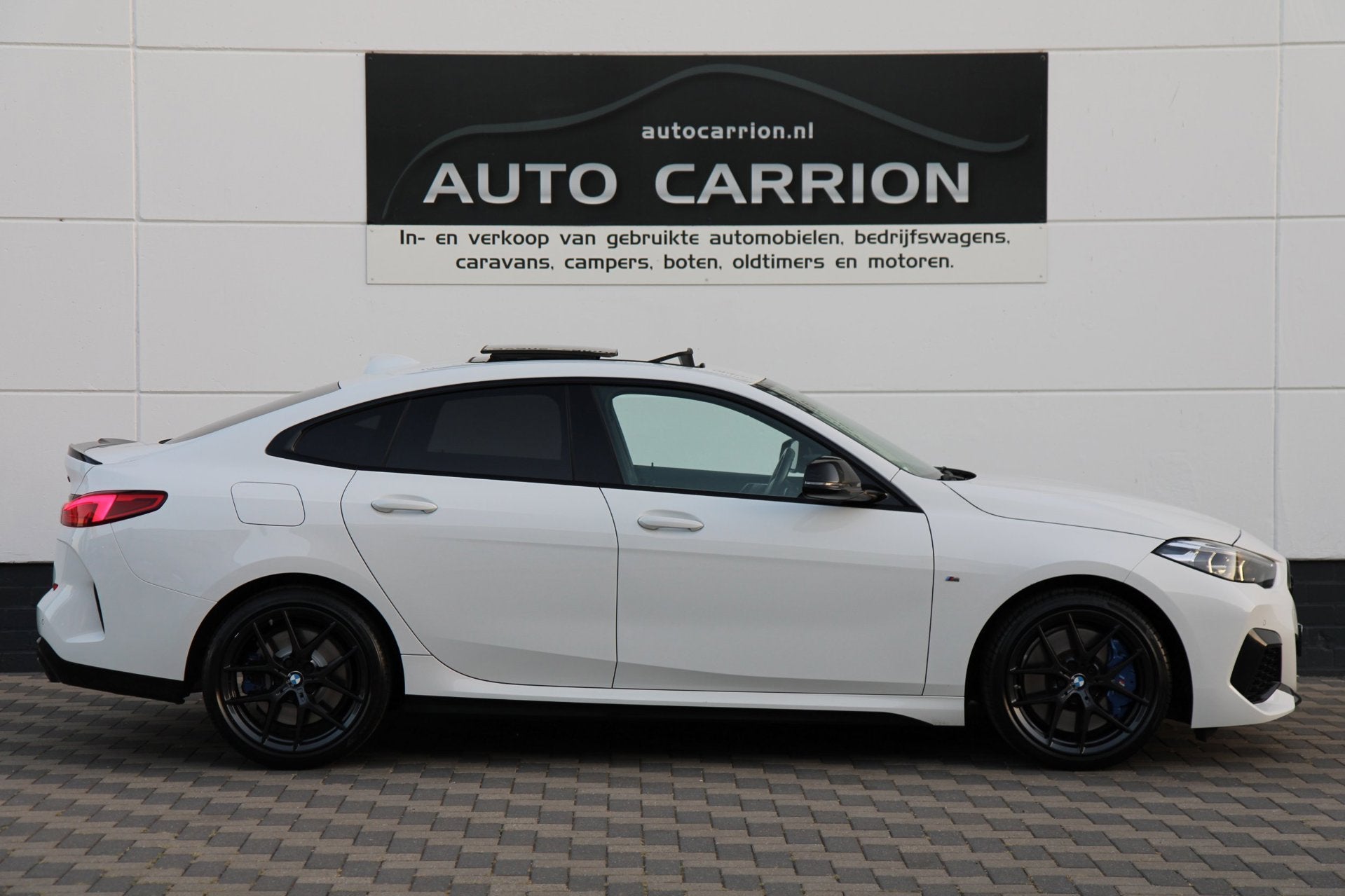 BMW 2-serie Gran Coupé M235i xDrive High Executive Carplay, Auto's, Automaat, Gebruikt, Zwart, 4 cilinders