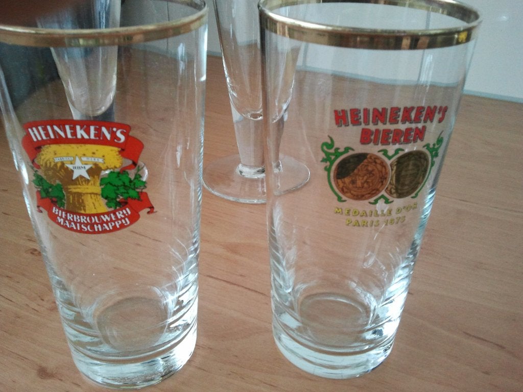 Heineken oude bierglazen met gouden rand, 4 stuks., Verzenden, Zo goed als nieuw, Glas of Glazen, Heineken
