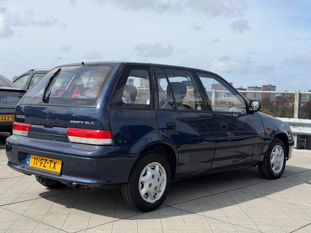 Suzuki Swift 1.3 GLX AUTOMAAT AIRCO Nieuwe Apk Goed Onderhou, Auto's, Gebruikt, 4 cilinders, Blauw, Bedrijf