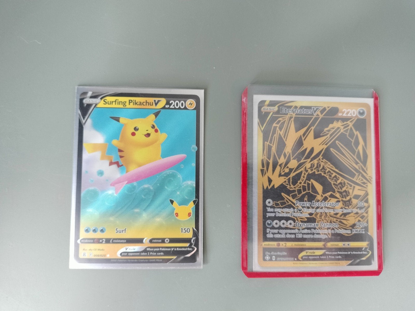 Pokémon kaarten: Surfing Pikachu V en Eternatus V, Ophalen of Verzenden, Zo goed als nieuw, Losse kaart