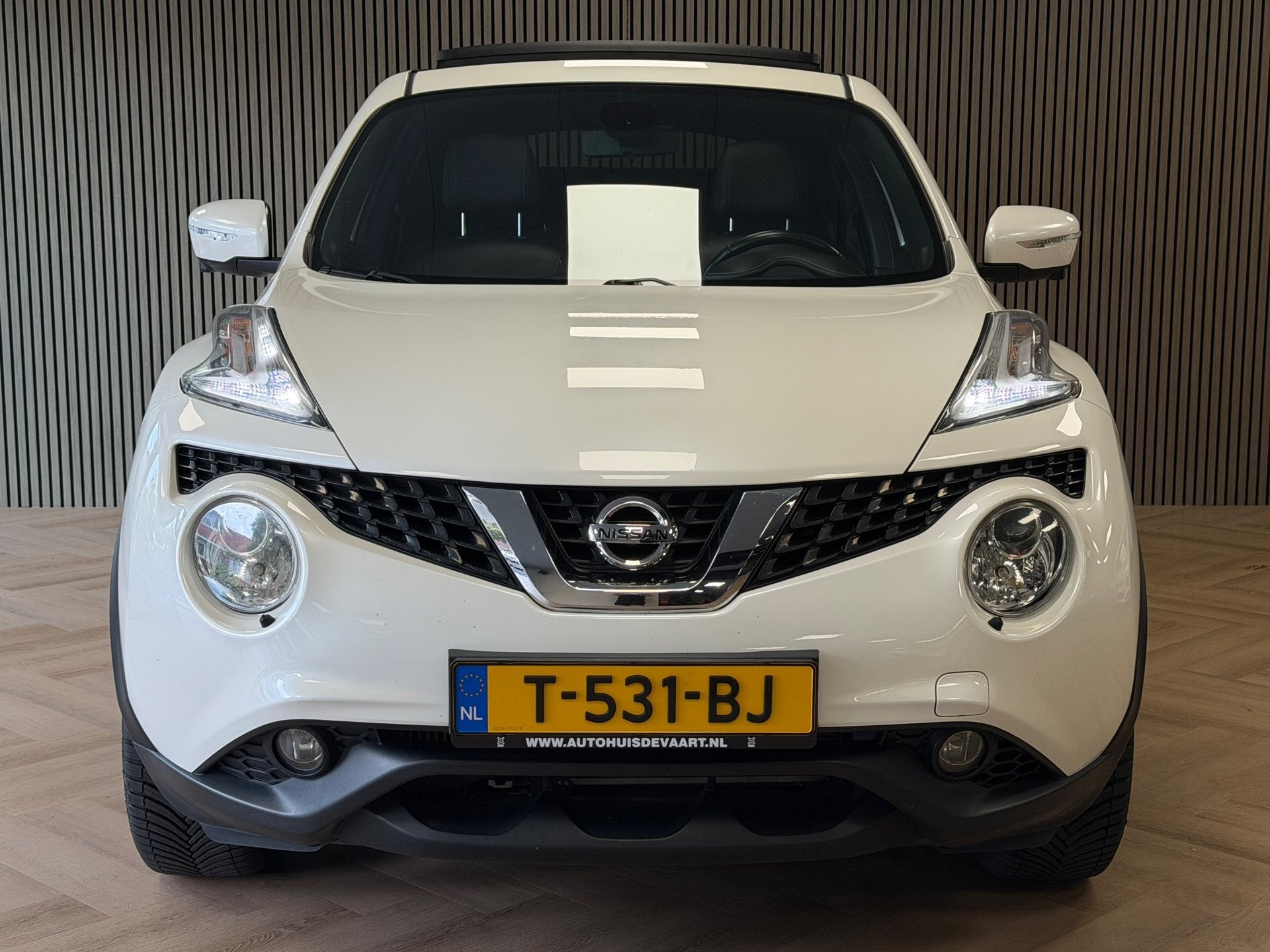 Nissan Juke 1.2 DIG-T S/S Tekna PANORAMADAK CAMERA NAVIGATIE, Auto's, Nissan, Met garantie (alle), 116 pk, Wit, Leder