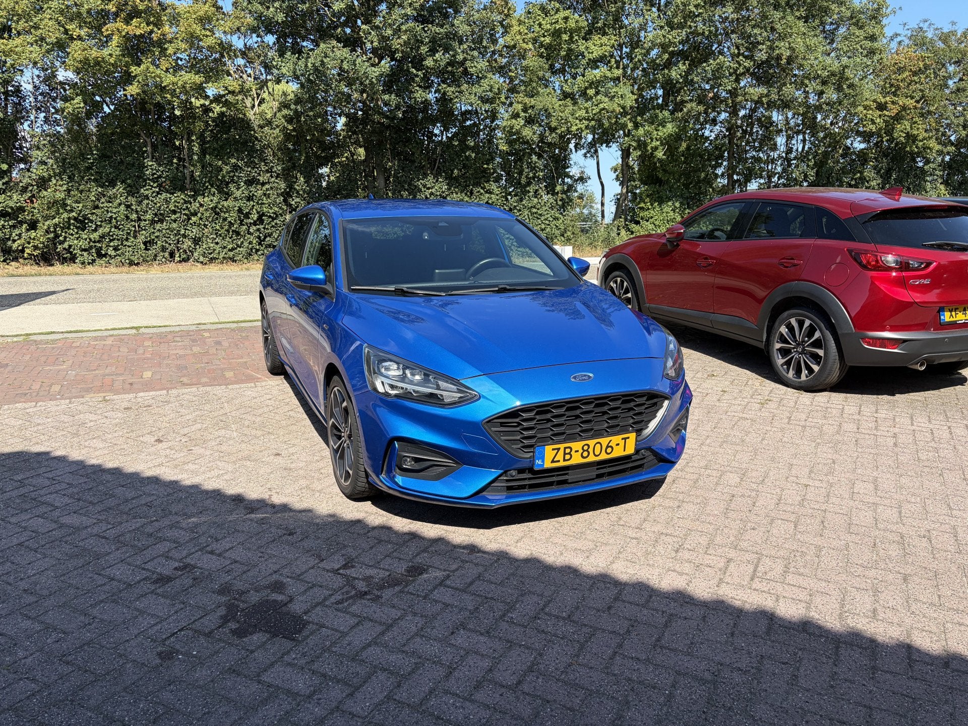 Ford Focus 1.5 EcoBoost ST Line Business 181PK TREKHAAK B&O, Auto's, Stof, 181 pk, Blauw, Origineel Nederlands