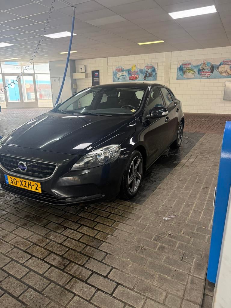 Volvo V40 1.6 D2 115PK 2012 Zwart, Auto's, Voorwielaandrijving, Zwart, 4 cilinders, 1257 kg