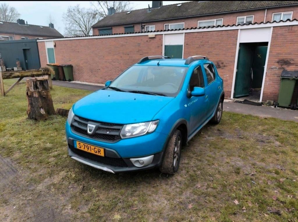 Dacia Sandero 0.9 TCE 66KW Stepway 2014 Blauw, Auto's, Voorwielaandrijving, 898 cc, 40 €/maand, Blauw