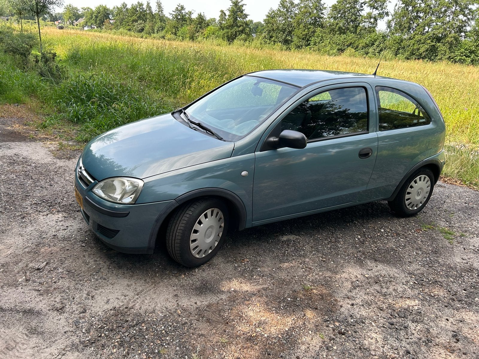 Opel Corsa 1.2 16V Twinport 3D 2007 grijs/blauw, Voorwielaandrijving, 450 kg, 31 €/maand, 4 cilinders