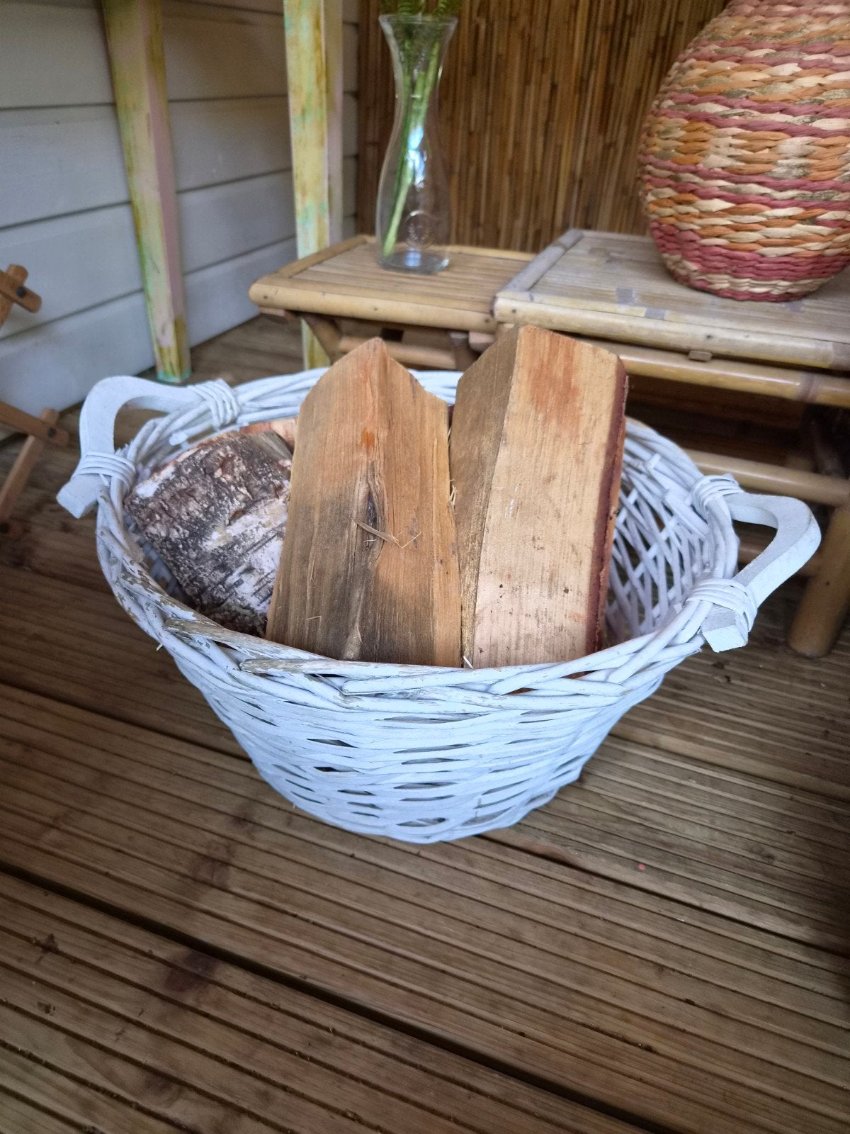 mand met hout, Ophalen, Rond, Riet