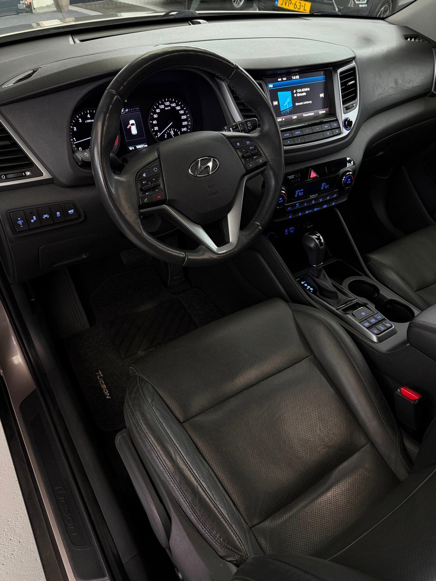 Hyundai Tucson 1.6 T-GDi 4WD Camera Trekhaak Panorama, Auto's, Gebruikt, 4 cilinders, Met garantie (alle), Leder