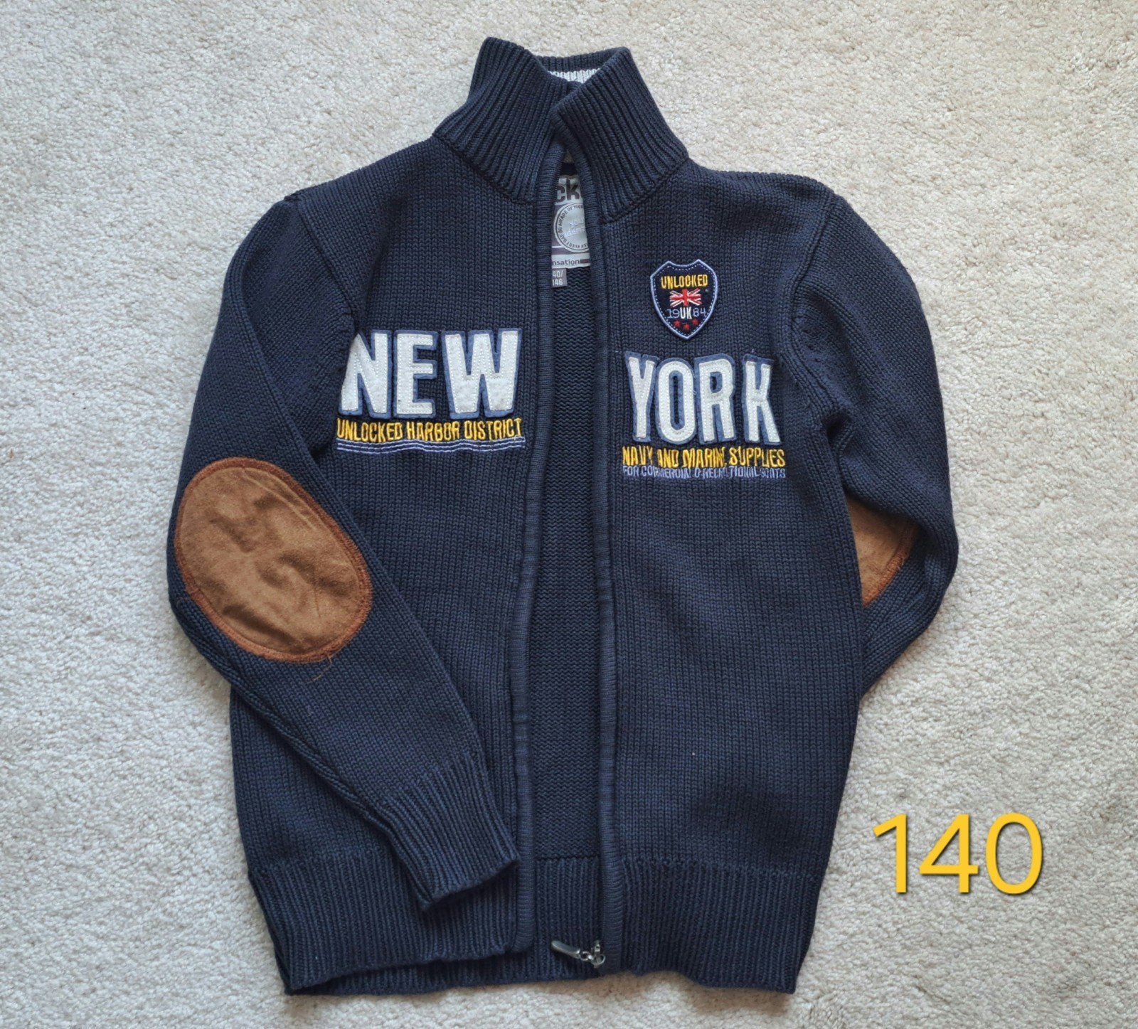 Unlocked knitwear vest in zeer goede staat!  Maat 140, Unloched, Trui of Vest, Ophalen of Verzenden, Zo goed als nieuw
