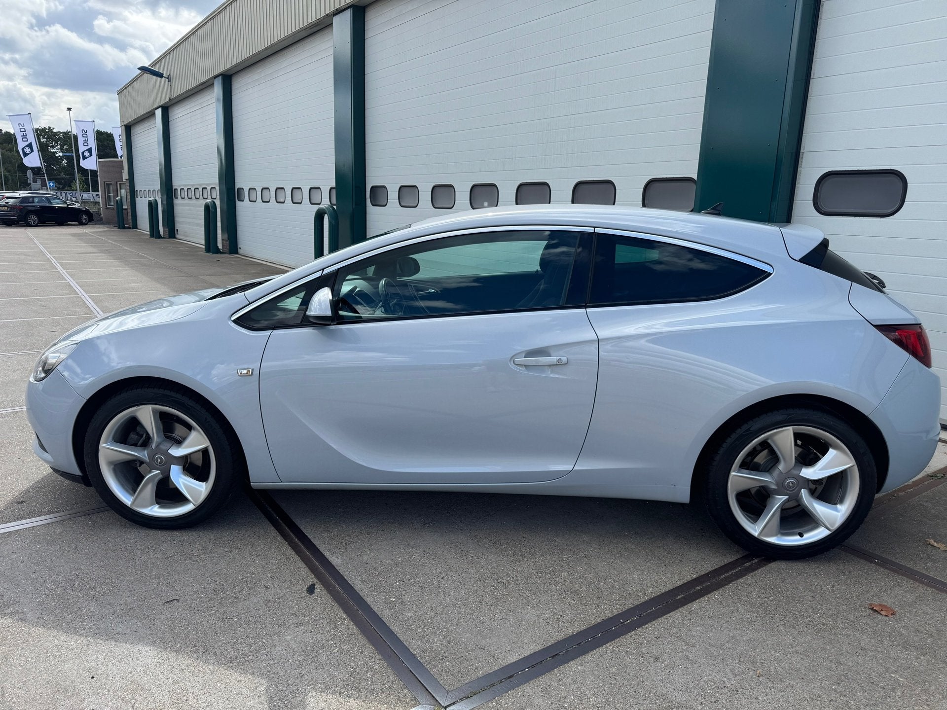 Opel Astra GTC 1.4 Turbo Sport, Auto's, Opel, Stof, Zwart, 4 cilinders, 700 kg