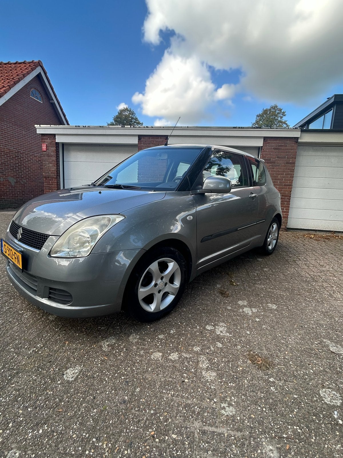 Suzuki Swift 1.3 3D 2007 Grijs, Auto's, 31 €/maand, Swift, Handgeschakeld, 1000 kg