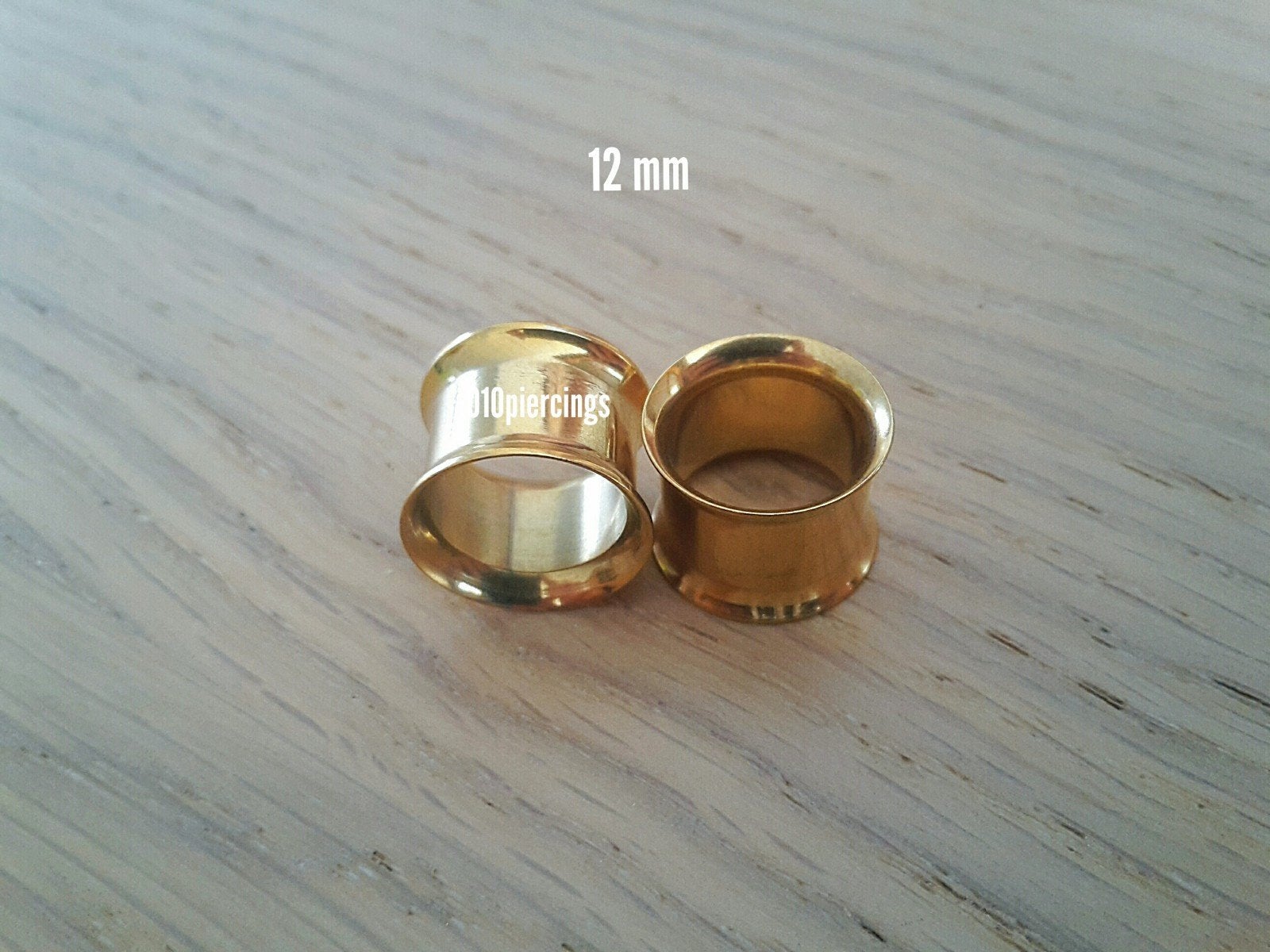 Nieuwe tunnels, pluggen. Staal. Goud. 5, 6, 12, 14 Mm., Ophalen of Verzenden, Zo goed als nieuw, Staal, Oor- of Traguspiercing