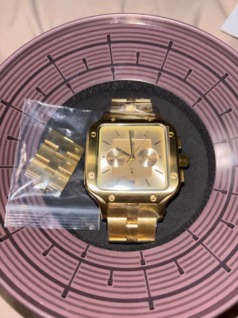 Ongedragen Titanio horloge goudkleurig met verpakking en doo, Sieraden, Tassen en Uiterlijk, Horloges | Heren, Overige merken