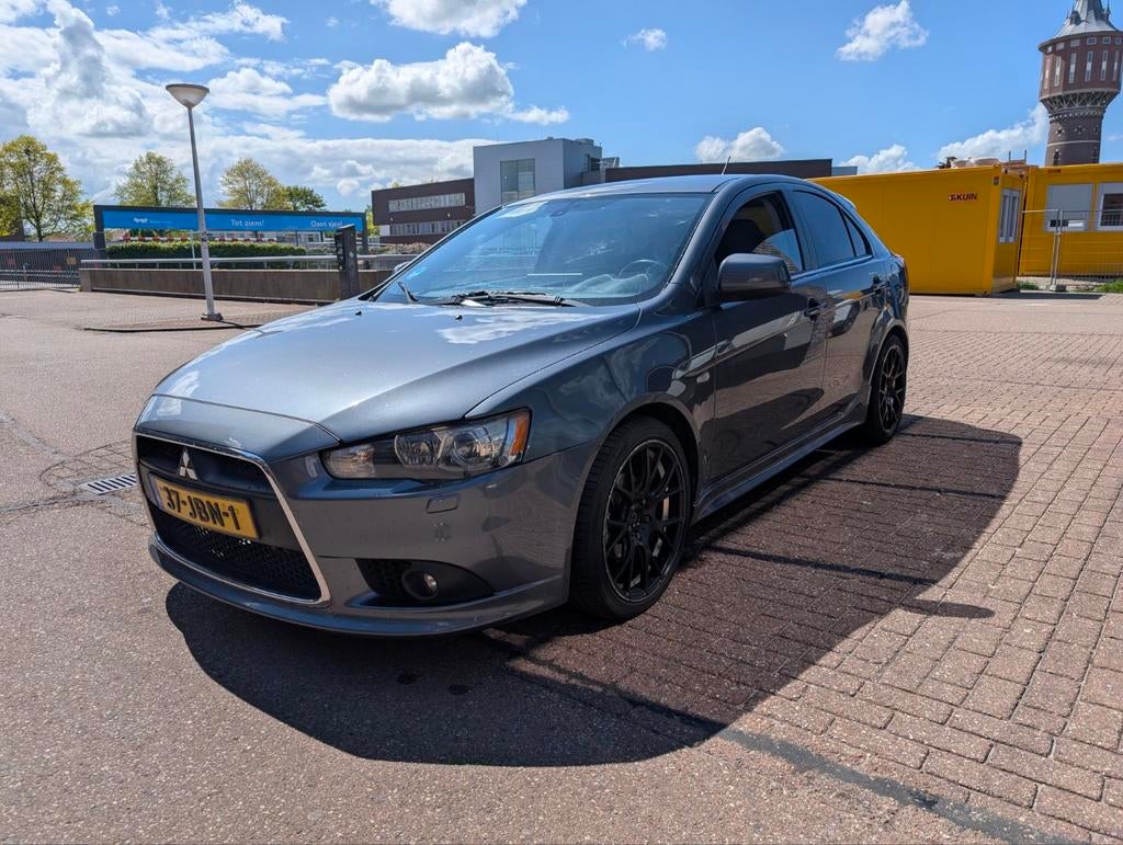 Mitsubishi Lancer 1.8 Mivec Sportback 2009 Grijs, Auto's, 1330 kg, Origineel Nederlands, Handgeschakeld, Particulier