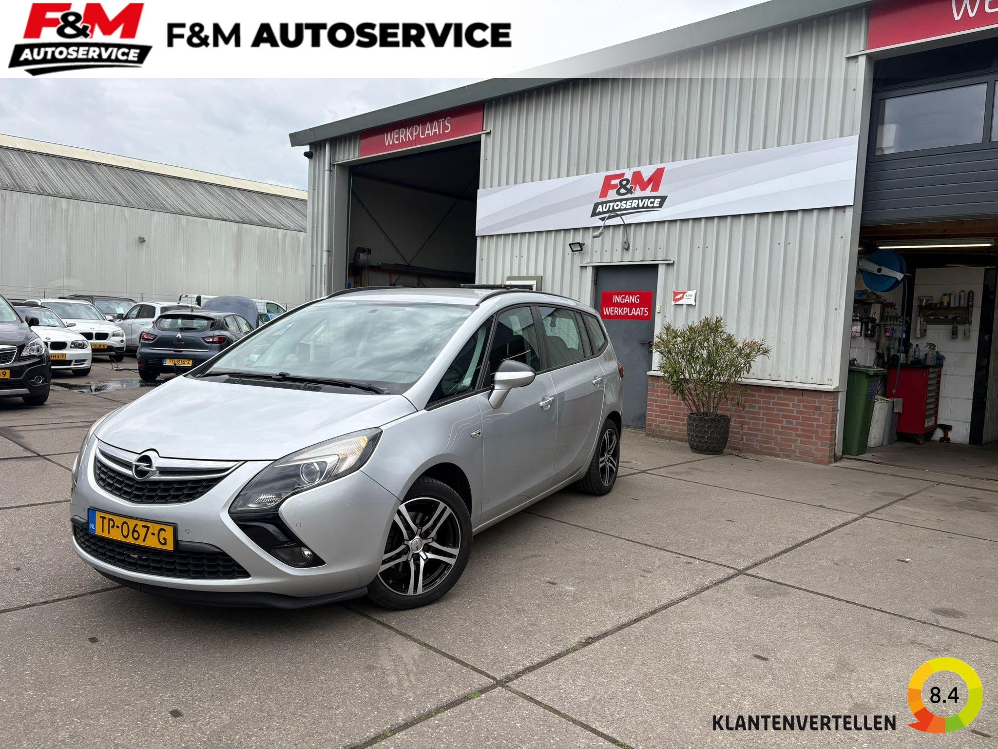 Opel Zafira Tourer 1.4 Edition 7p. Clima, stoel-stuur verwar, Auto's, Opel, Euro 5, Gebruikt, Zwart, 4 cilinders