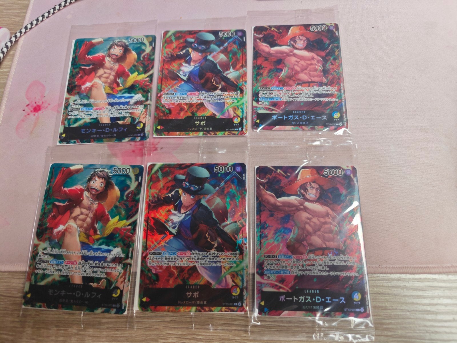 One Piece  Promos ST13-001, ST13-002, ST13-003 Sealed, Ophalen of Verzenden, Nieuw, Meerdere kaarten, Foil