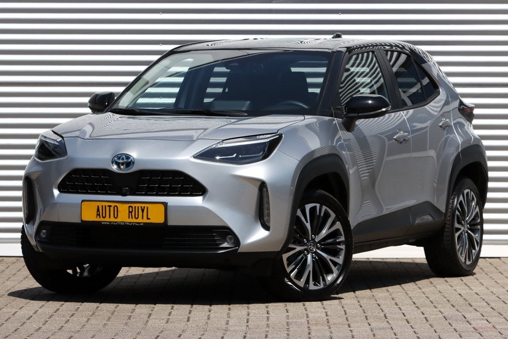Toyota Yaris Cross 1.5 Hybrid Executive Bi-Tone Trekh., Gebruikt, Zwart, Leder en Stof, Bedrijf