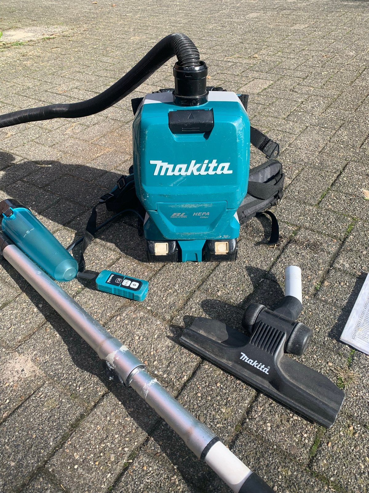Makita DVC261Z Rugstofzuiger - Draadloos en Krachtig, Stofzak, Gebruikt, Draadloos, Ophalen of Verzenden