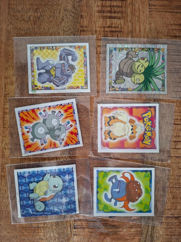 6 Merlin Pokémon stickers uit 1999, Ophalen of Verzenden, Zo goed als nieuw, Meerdere kaarten, Foil